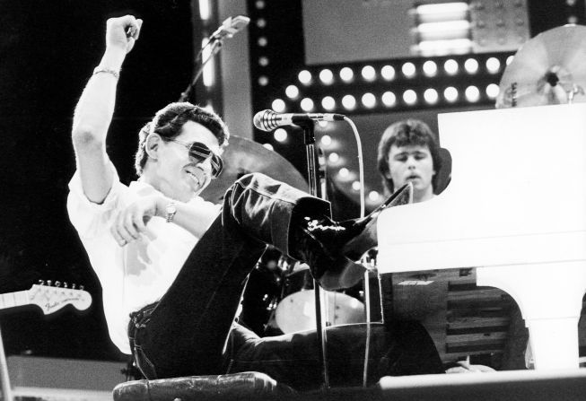 <a target="_blank">Jerry Lee Lewis,</a> the piano-pounding, foot-stomping singer who electrified early rock 'n' roll with hits like "Great Balls of Fire" and "Whole Lotta Shakin' Goin' On" before marital scandal derailed his career, died at the age of 87, according to a statement from his representative, Zach Farnum, on October 28.