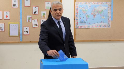 Interim Prime Minister Yair Lapid casts his vote at a polling station in Tel Aviv on November 1, 2022. 