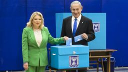 JERUSALEM, ISRAEL - NOVEMBER 01:  Former Israeli Prime Minister and Likud party leader Benjamin Netanyahu and his wife Sara Netanyahu cast their vote in the Israeli general election on November 1, 2022 in Jerusalem, Israel. Israelis return to the polls on November 1 for a fifth general election in four years to vote for a new Knesset, the 120-seat parliament.  (Photo by Amir Levy/Getty Images)