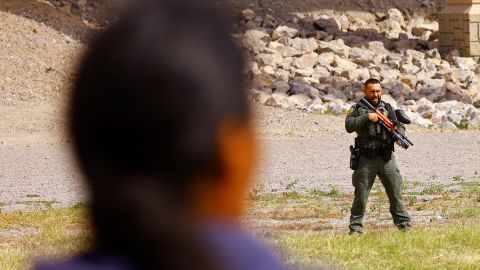 A U.S. Border Patrol agent stands guard at the U.S.-Mexico border on October 31, 2022.