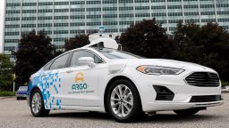 A Ford Argo AI test vehicle is parked in front of the Ford headquarters in Dearborn, Michigan on July 12, 2019. 