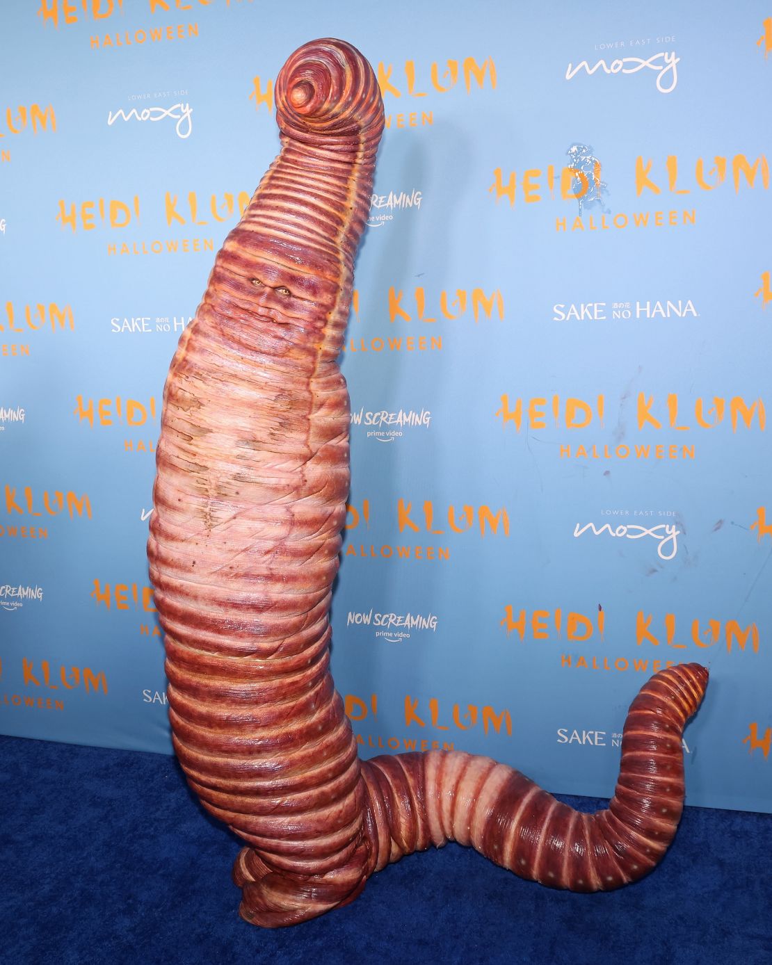 Heidi Klum attended her renowned Halloween party dressed as a terrifying earthworm.