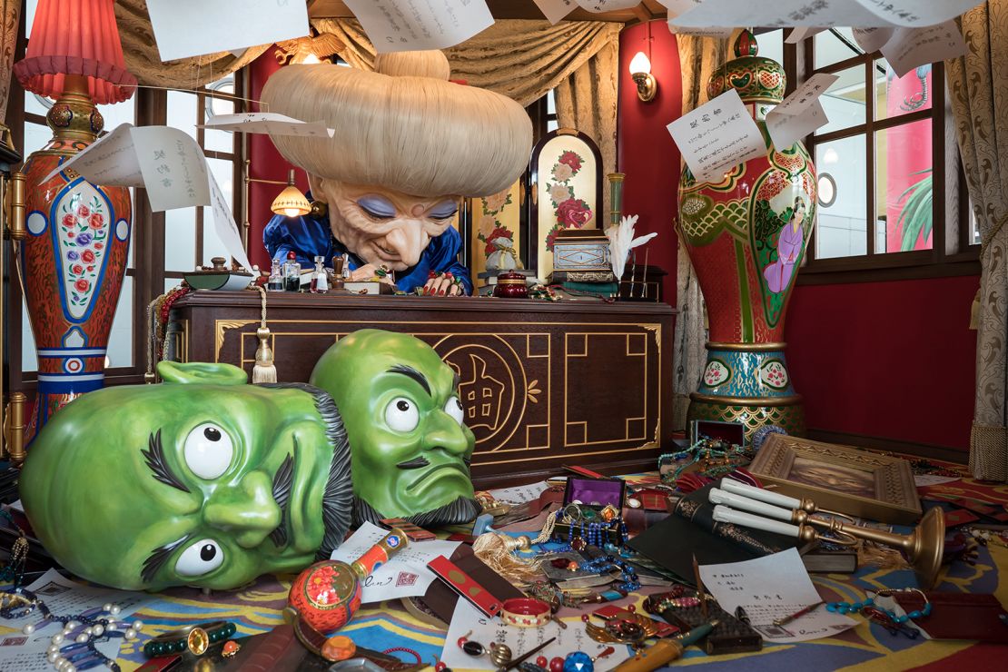 Visitors can find Yubaba -- a powerful witch -- and Kashira -- the green 'heads' -- from the film 'Spirited Away' in Ghibli Park's Grand Warehouse area.
