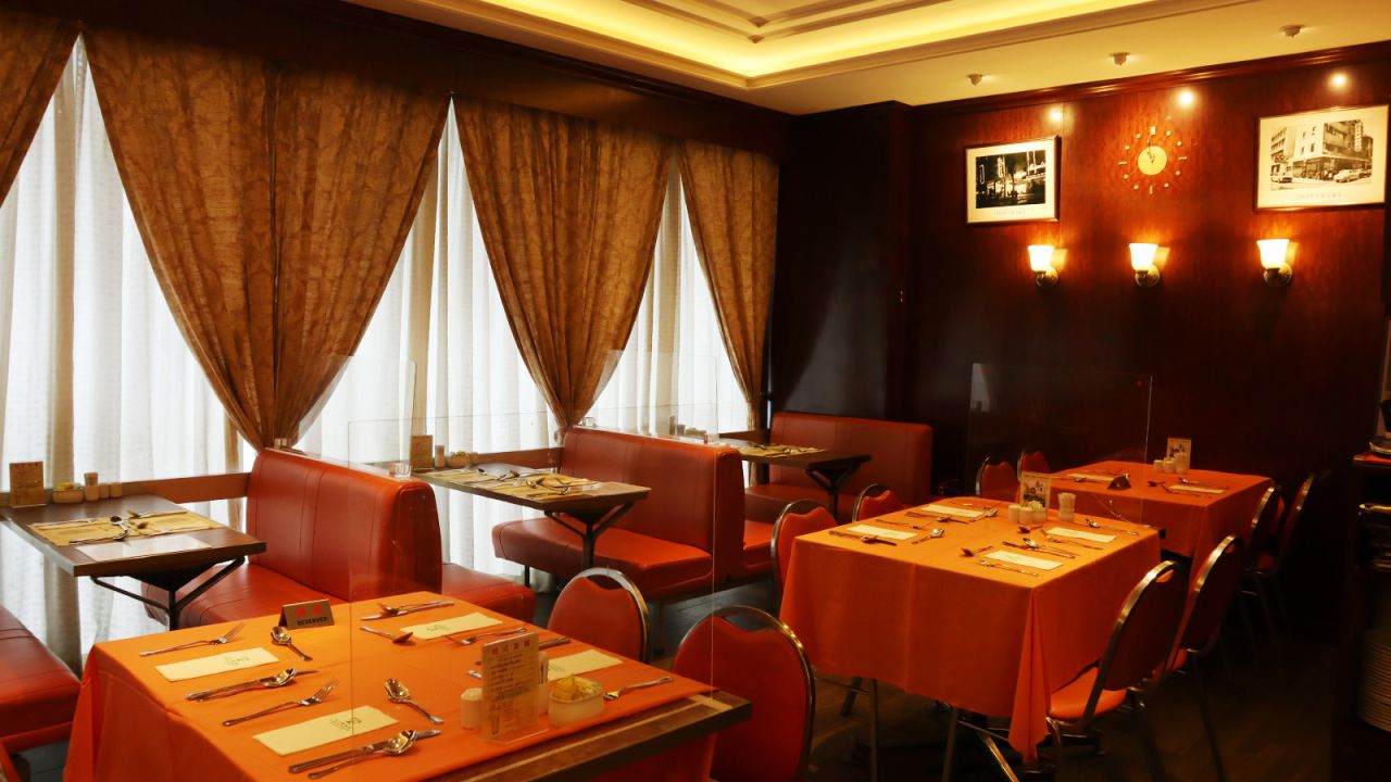 <strong>Retro-style decorations: </strong>The wood-paneled walls, lace voile-covered windows and leather booth seating exude an old-world elegance at Tai Ping Koon's Yau Ma Tei branch.
