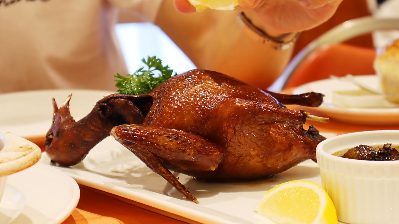 <strong>A history-changing dish: </strong>Many diners at Tai Ping Koon Restaurant, one of the oldest restaurants in Hong Kong, come for its signature TPK Style Roasted Pigeon. 