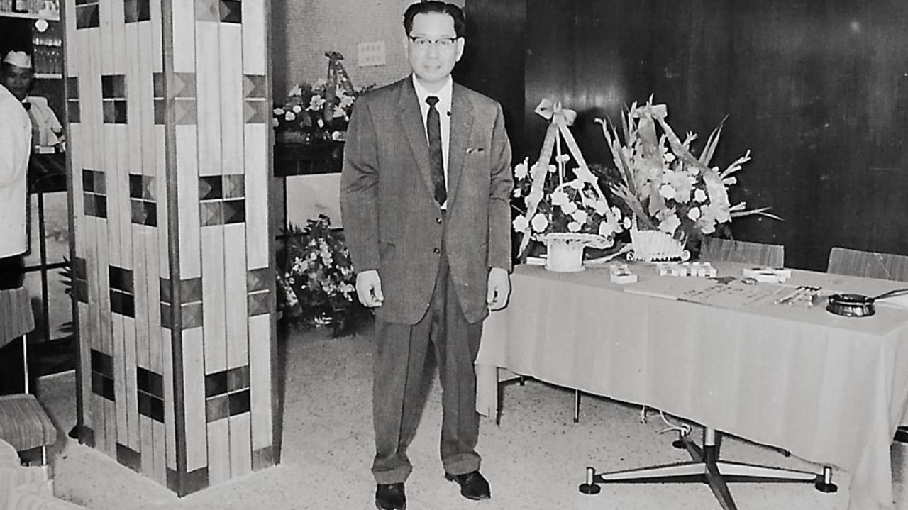 A photo of Andrew Chui's grandfather, Chui Hon Chor, taken at the Yau Ma Tei branch.