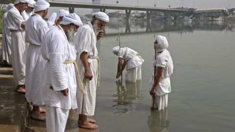 Members of Iraq's Sabean-Mandaean community take part in a ritual celebrating Prosperity Day on the banks of the Tigris River in the capital Baghdad, on Tuesday. 