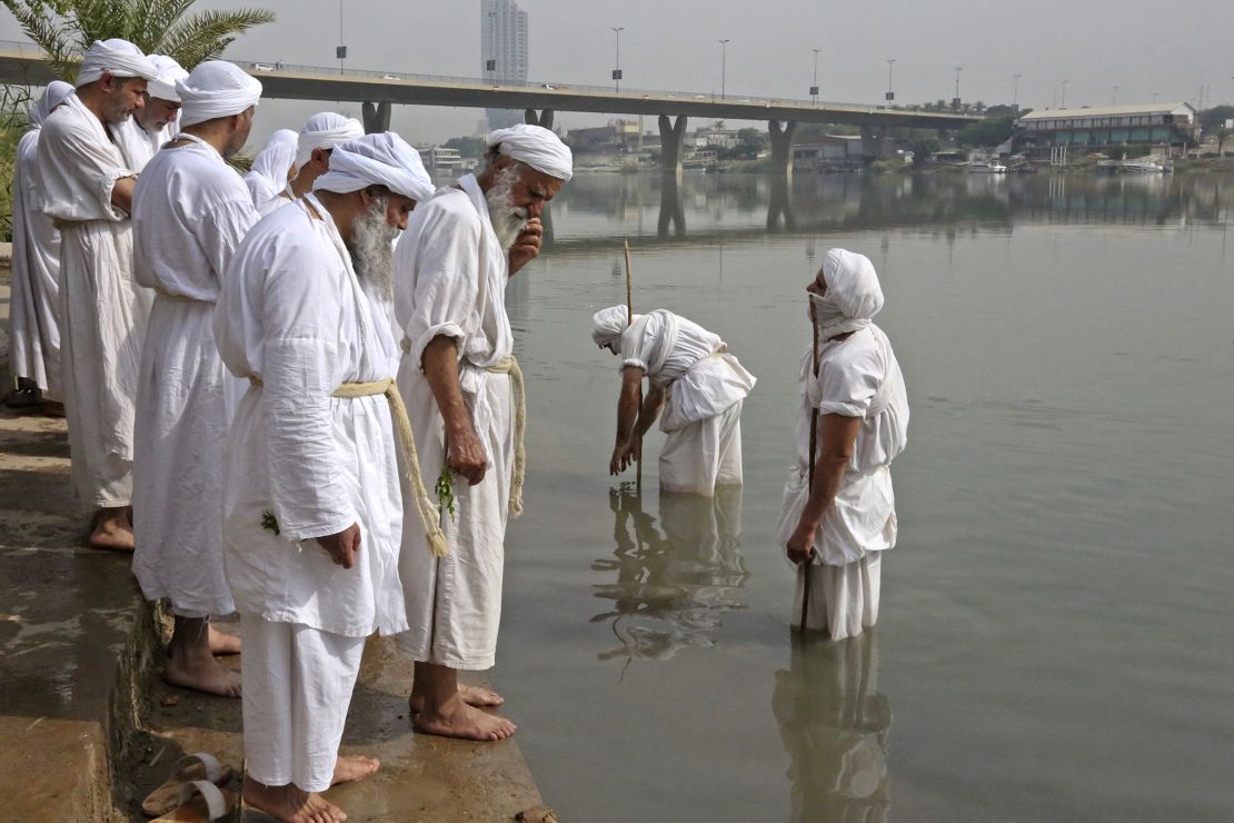 Members of Iraq's Sabean-Mandaean community take part in a ritual celebrating Prosperity Day on the banks of the Tigris River in the capital Baghdad, on Tuesday. 
