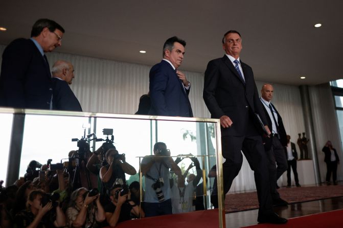 Bolsonaro arrives to give a statement to the press at the presidential palace in Brasília on November 1. He said he would "follow all the orders and prescriptions of the constitution" during a <a href="index.php?page=&url=https%3A%2F%2Fwww.cnn.com%2F2022%2F10%2F31%2Famericas%2Fbrazil-election-result-explainer-intl-latam%2Findex.html" target="_blank">short and ambiguous</a> speech after days of silence following his election loss.