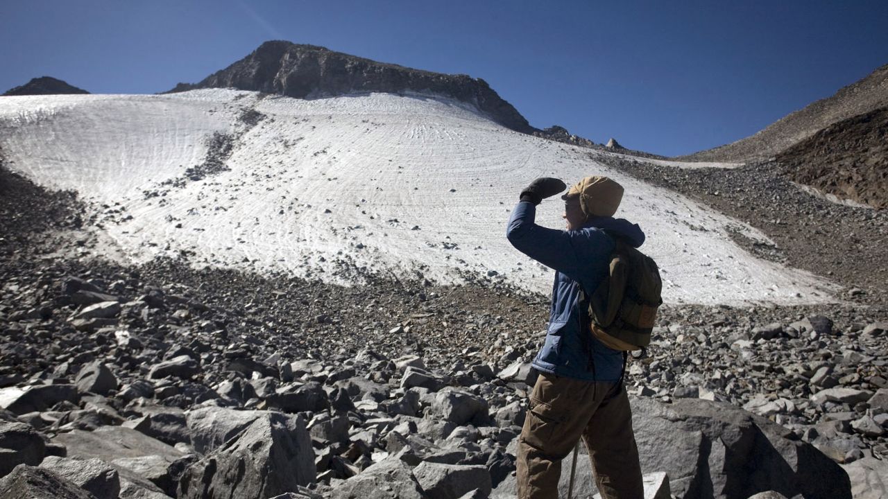 A hiker looks out at the Lyell glacier in Yosemite National Park in 2008.