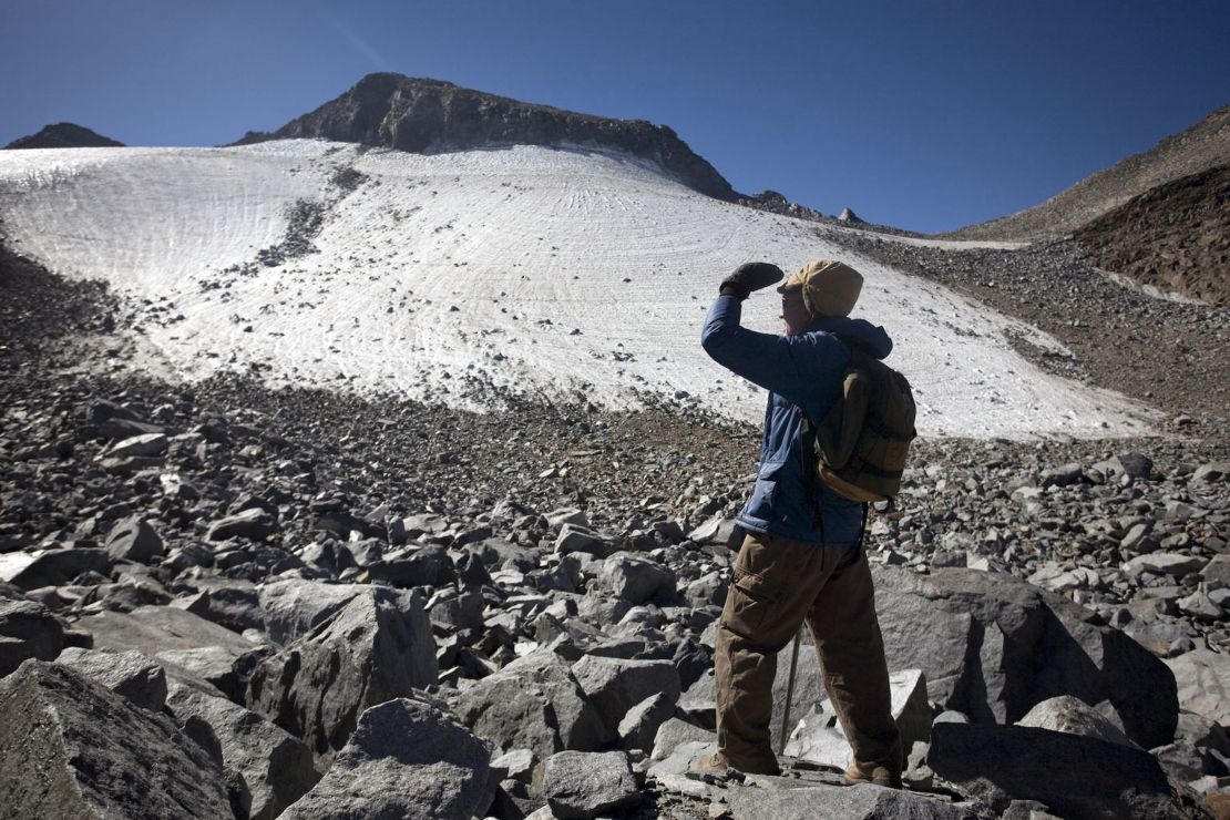 A hiker looks out at the Lyell glacier in Yosemite National Park in 2008.
