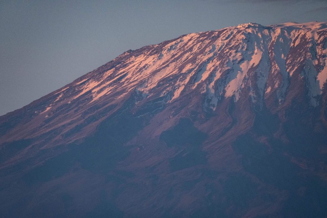 The snow-capped Mount Kilimanjaro at sunrise in 2021. UNESCO reported that glaciers at World Heritage sites are shedding around 58 billion tons of ice each year.