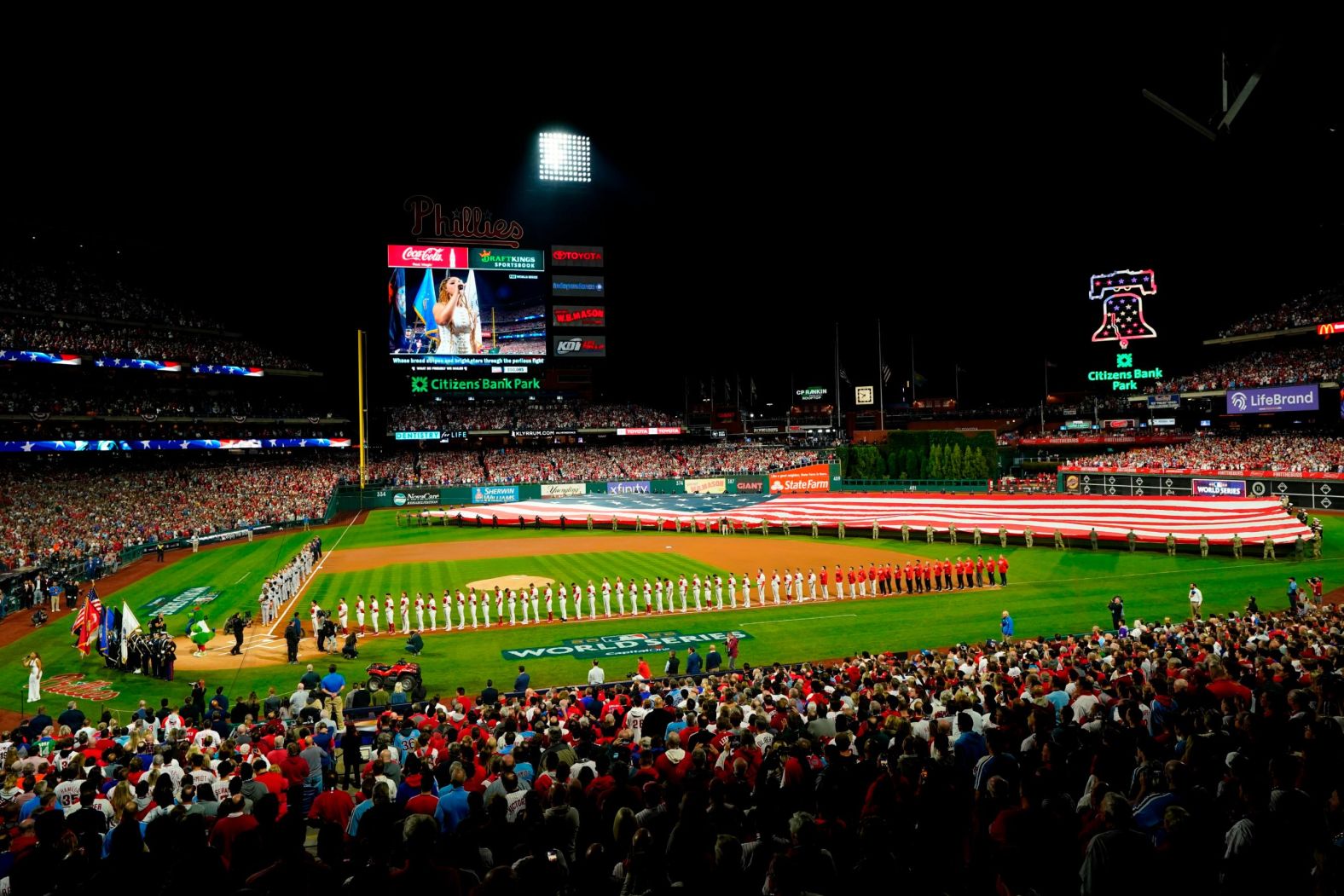 Players line up for the National Anthem before Game 3. It was the first World Series game in Philadelphia since 2009.
