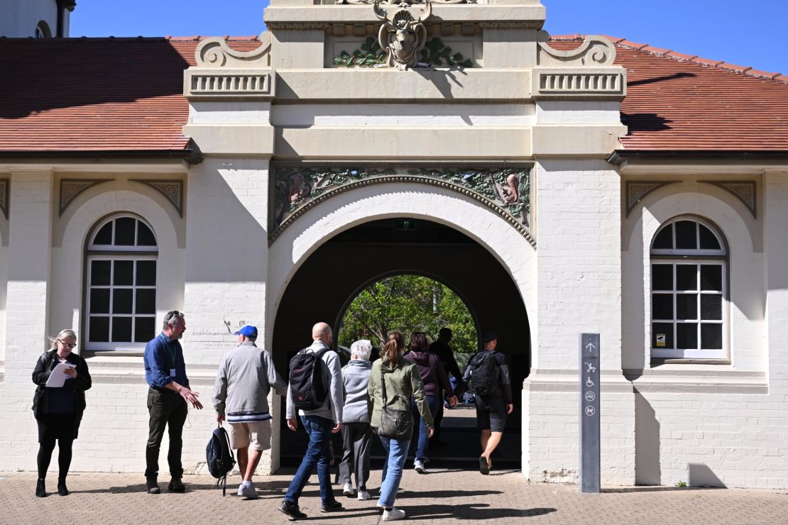 Patrons enter through the main entrance at Taronga Zoo in Sydney, Wednesday, November 2, 2022. 