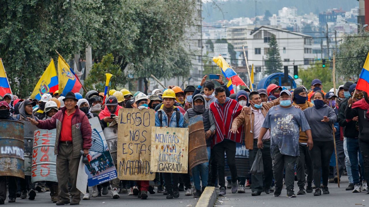 Demonstrators march to the House of Ecuadorian Culture in Quito, on June 22, 2022, during indigenous-led protests against the government. 