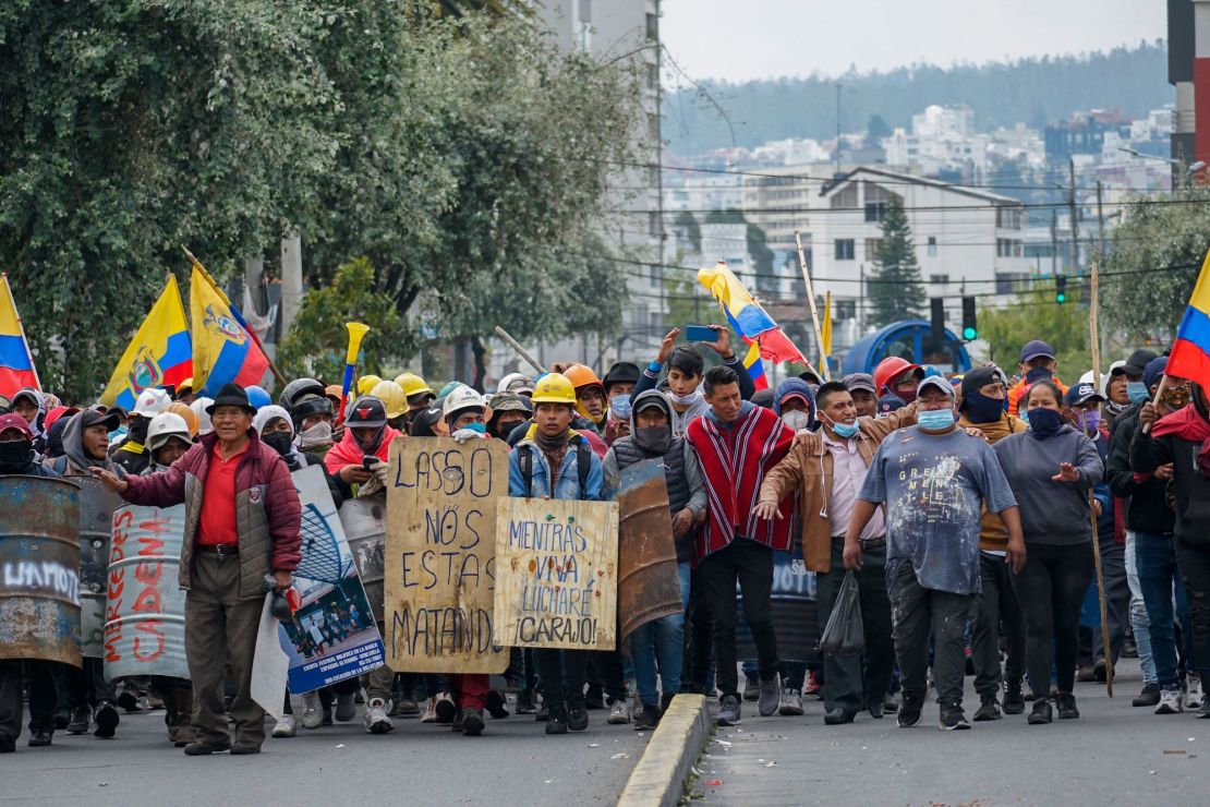 Demonstrators march to the House of Ecuadorian Culture in Quito, on June 22, 2022, during indigenous-led protests against the government.
