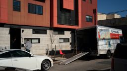 Furniture is loaded into a Uhaul moving truck outside an apartment complex in Philadelphia, Pennsylvania, U.S., on Saturday, Jan. 30, 2021. Housing starts are set to increase by a further 3% year-on-year and house prices are expected to climb a further 2.5% nationwide in 2021, building on the strength of the second half of 2020, according to J.P. Morgan Research forecasts. Photographer: Caroline Guttman/Bloomberg