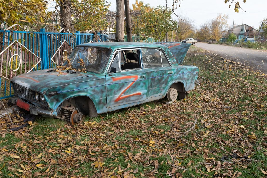 An abandoned car in a southern Ukrainian village formerly occupied by Russian forces is marked with the letter 'Z'.