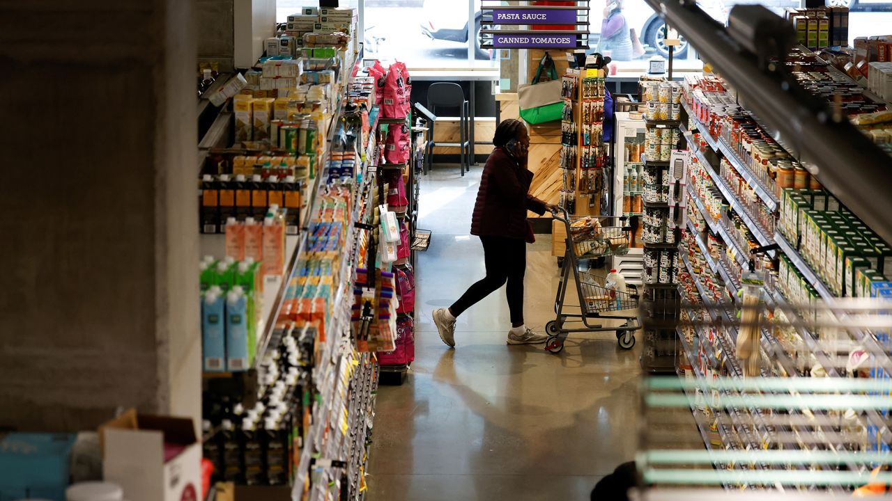 A customer shops at a supermarket in Washington, D.C., on October 28.