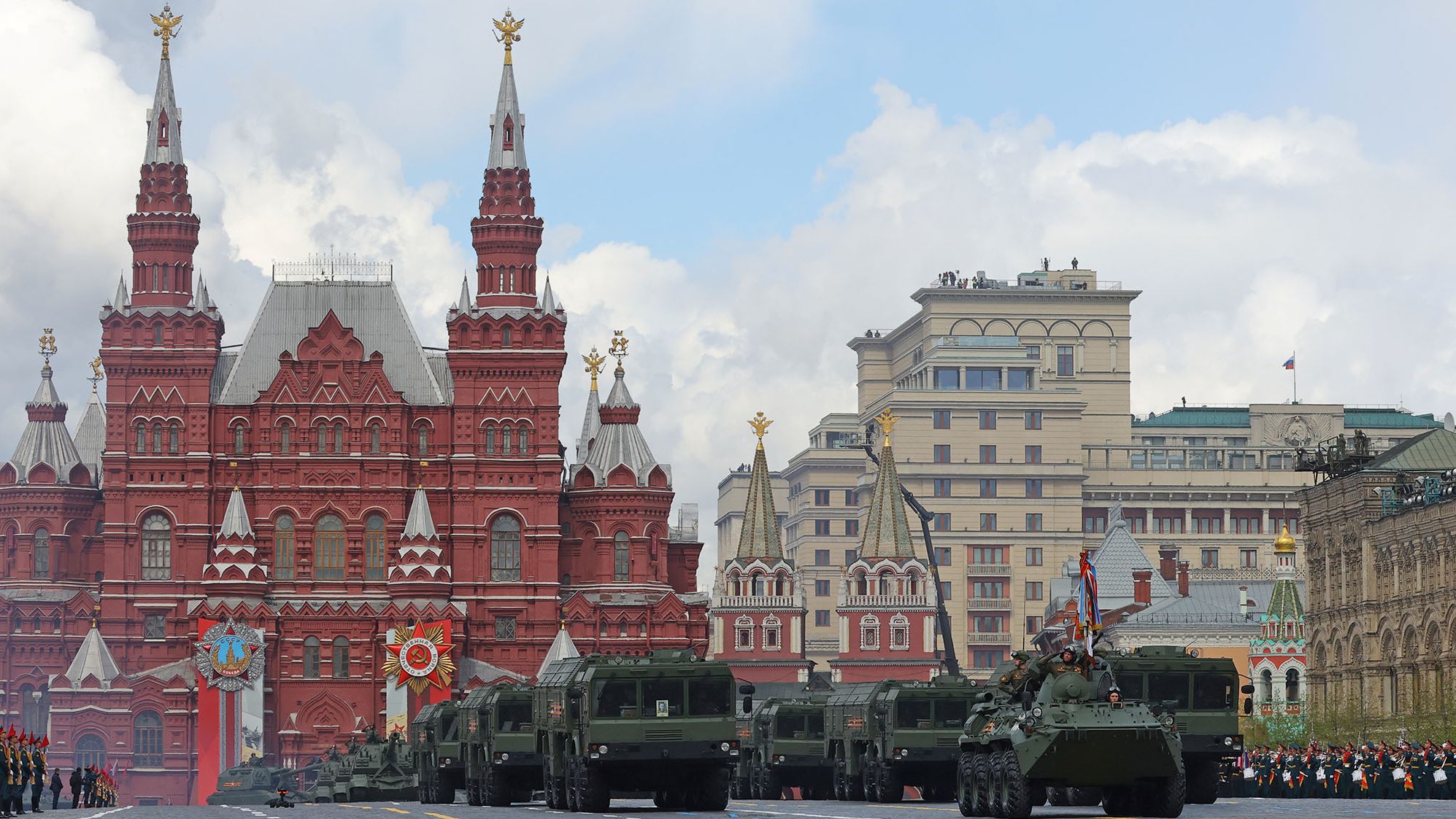 A Russian BTR-82A armoured personnel carrier, Iskander-M missile launchers and MSTA-S self-propelled howitzers drive in Red Square during a parade on Victory Day, which marks the 77th anniversary of the victory over Nazi Germany in World War Two, in central Moscow, Russia May 9, 2022.