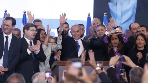 Benjamin Netanyahu, leader of the Likud party, center, waves at the party's headquarters in Jerusalem, Israel, on Wednesday, Nov. 2, 2022. 