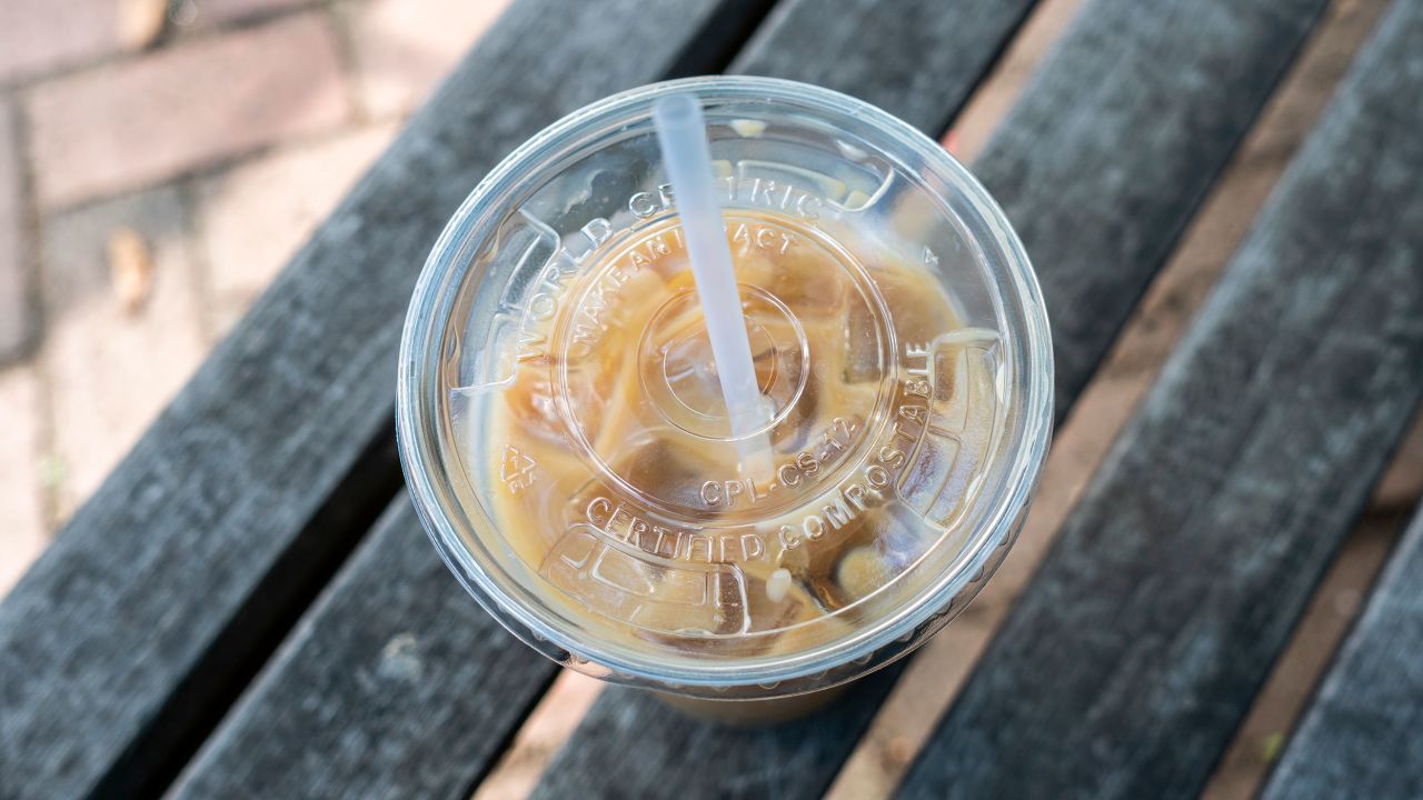 Iced coffee in a "compostable" plastic cup in New York in August.