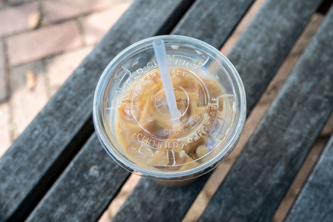 Iced coffee in a "compostable" plastic cup in New York in August.