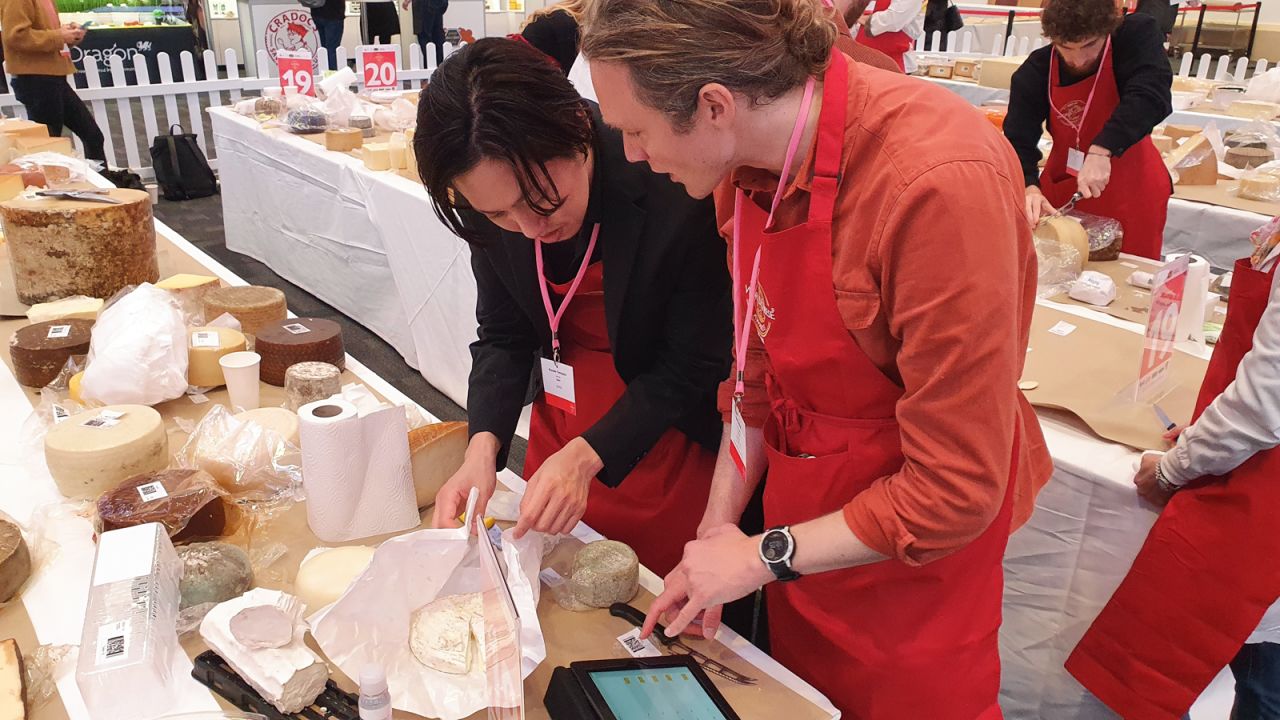 <strong>On song: </strong>Some 250 international judges were tasked with tasting and evaluating the cheeses. Here, Tom Chatfield and Kazuaki Tomiyama try their first few of about 50 cheeses. "Some cheeses have a song that keeps on going," says Chatfield.