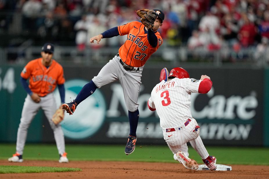 Philadephia's Bryce Harper steals second under Houston second baseman Jose Altuve.