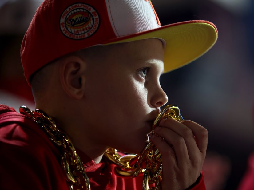 A young Phillies fan is seen wearing a gold chain Wednesday.