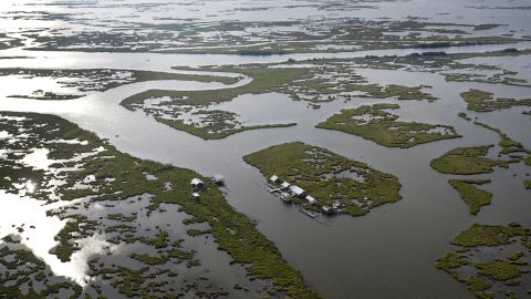 In this aerial photo, camps are seen amid fragmented marsh in Plaquemines Parish, Louisiana, Wednesday.