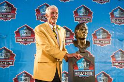 Former NFL punter Ray Guy with his bust during the NFL Class of 2014 Pro Football Hall of Fame Enshrinement Ceremony at Fawcett Stadium on August 2, 2014, in Canton, Ohio.