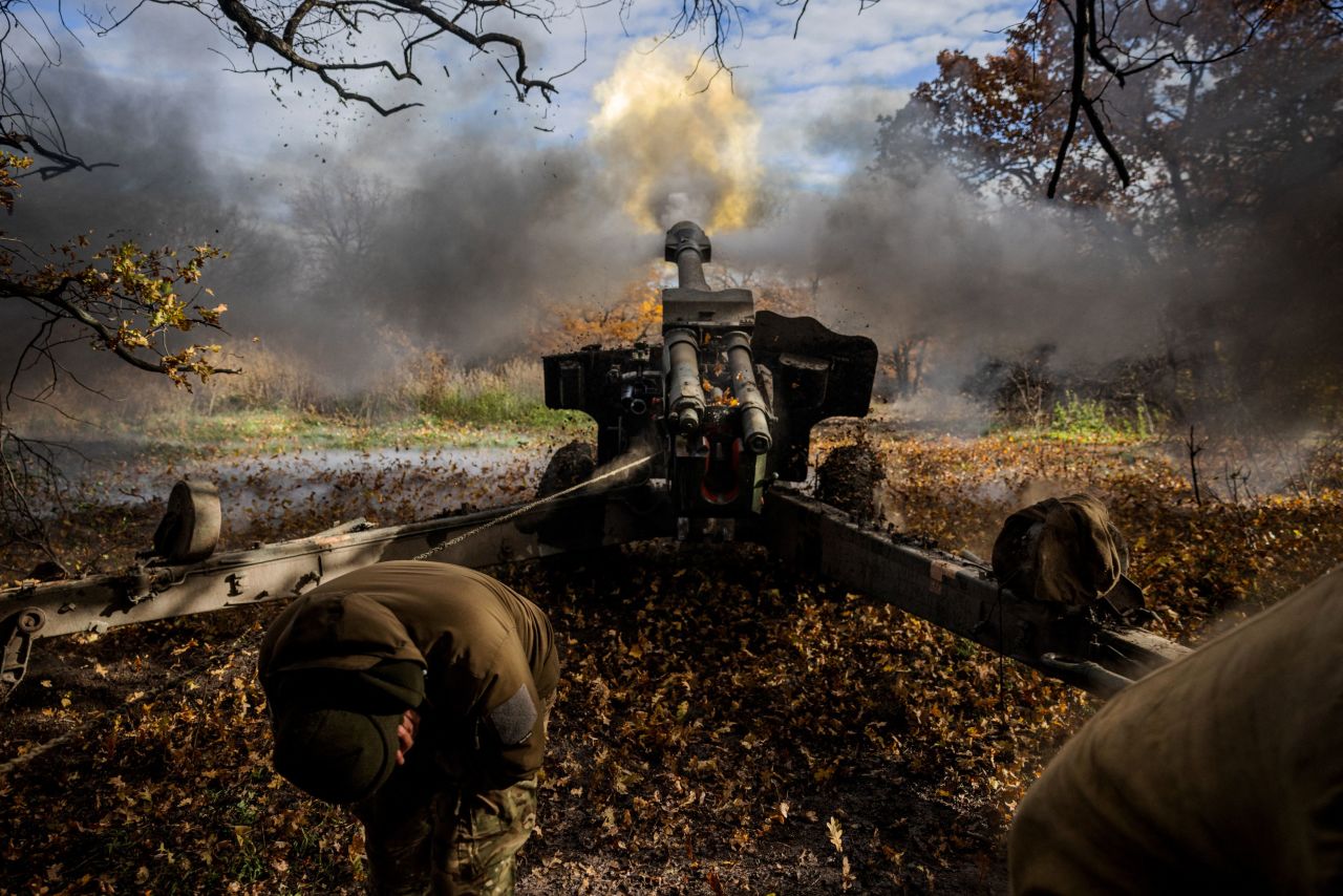 Ukrainian artillerymen fire a gun-howitzer on the front line near Bakhmut, in eastern Ukraine's Donetsk region, on Monday, October 31.