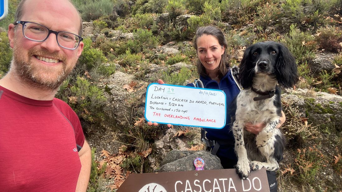 <strong>Building memories:</strong> The pair, seen hiking in Cascata do Arado, Portugal with Peggy, say their beloved dog has been "living her best life" during their time on the road. 
