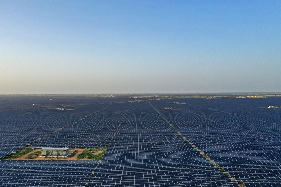 This photo taken on October 6, 2021 shows solar panels at the Bhadla Solar Park in the northern Indian state of Rajasthan.