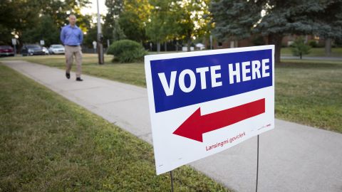 LANSING, MI - AUGUST 02: A voter arrives at a polling location to cast his ballot in the Michigan Primary Election on August 2, 2022 in Lansing, Michigan. This Midterm election, voters in Michigan will cast their ballots for the first time in districts that were newly drawn by a new nonpartisan redistricting committee. Michigan voters will also select their candidates for Governor for the upcoming November Midterm General Election, either the current democrat Governor Gretchen Whitmer or one of 5 republican gubernatorial candidates. (Photo by Bill Pugliano/Getty Images)