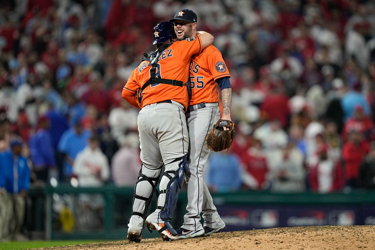 Houston Astros relief pitcher Ryan Pressly and catcher Christian Vazquez celebrate their win over the Philadelphia Phillies in Game 4 of the World Series on Wednesday, November 2, in Philadelphia. For just the second time in World Series history, a no-hitter was thrown. The Astros won 5-0 and tie the series at 2-2.