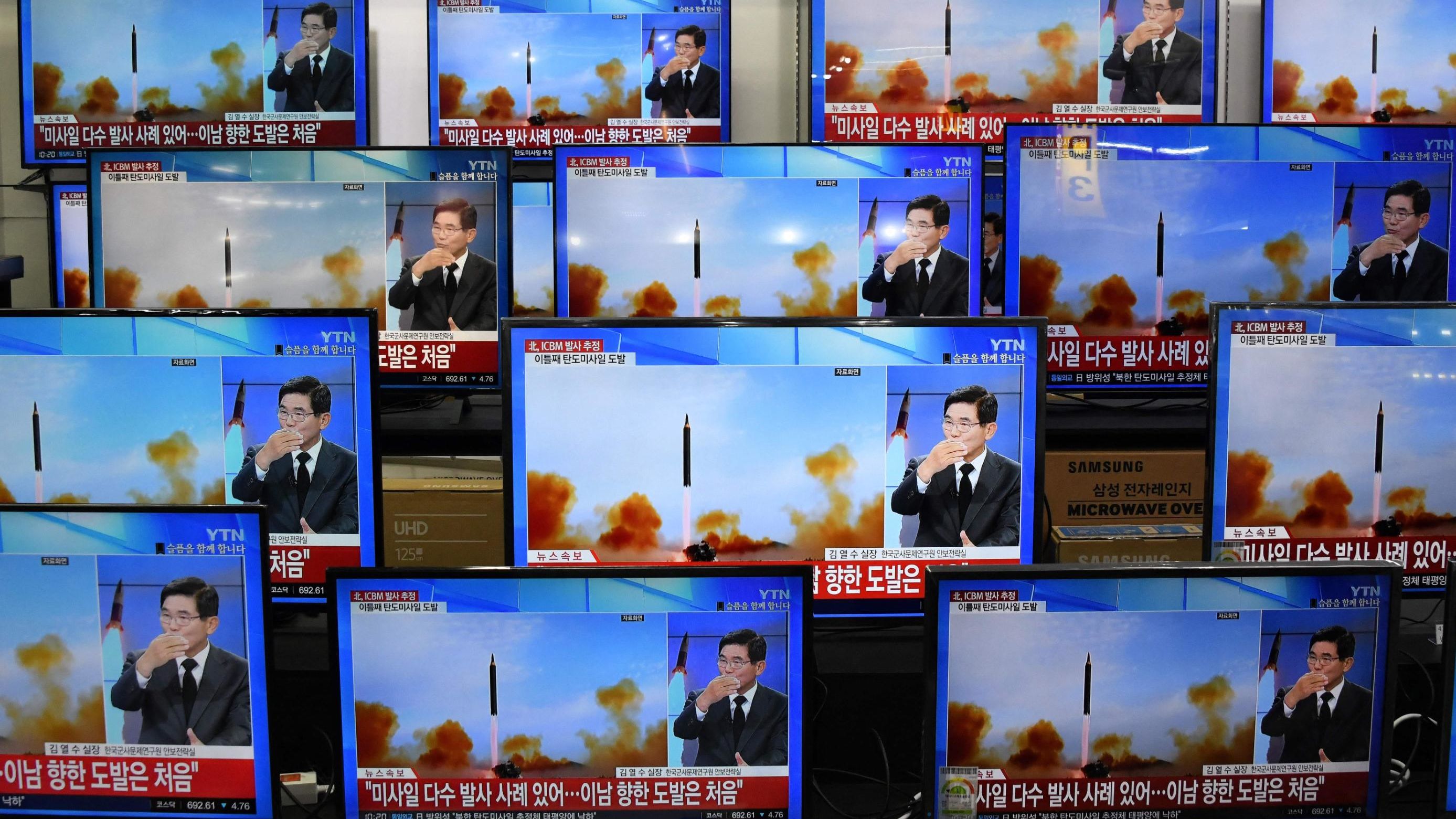 Television screens in an electronic market in Seoul show a news report about <a href="https://www.cnn.com/2022/11/02/asia/north-korea-missile-thursday-intl-hnk" target="_blank">the latest North Korean missile launch</a> with file footage on Thursday, November 3.