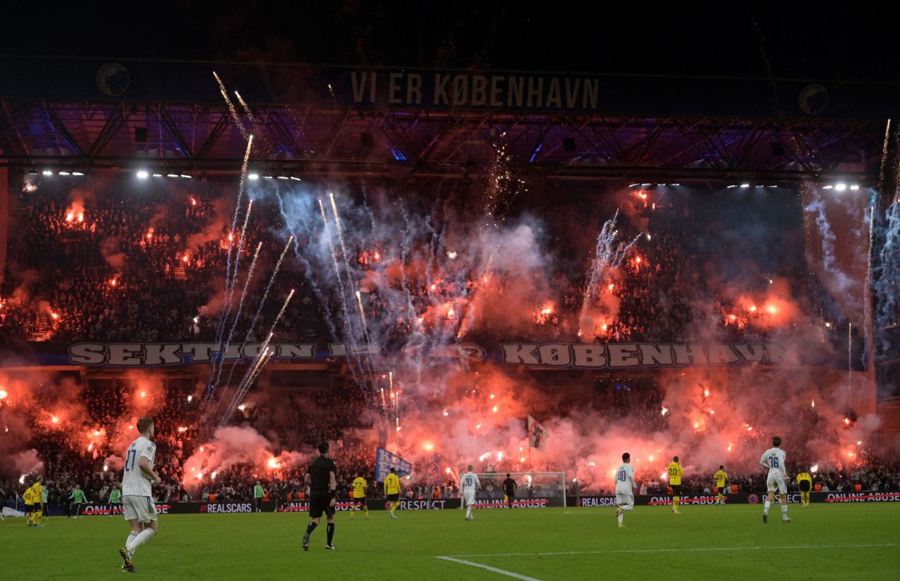 FC Copenhagen fans let off flares in the stands during a match against Borussia Dortmund in Copenhagen, Denmark, on Wednesday, November 2.