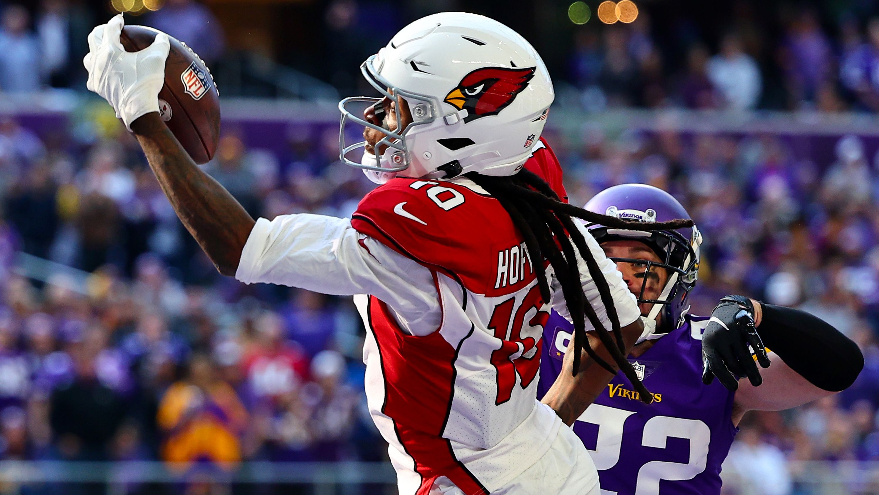 DeAndre Hopkins makes a one-handed catch to reel in a touchdown for the Arizona Cardinals against the Minnesota Vikings on Sunday, October 30, in Minneapolis, Minnesota. <a href="https://www.cnn.com/2022/09/12/sport/gallery/nfl-2022-season/index.html" target="_blank">See the best photos from the 2022 NFL season</a>.