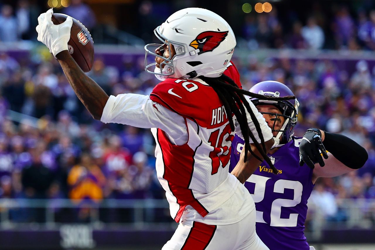 DeAndre Hopkins makes a one-handed catch to reel in a touchdown for the Arizona Cardinals against the Minnesota Vikings on Sunday, October 30, in Minneapolis, Minnesota. See the best photos from the 2022 NFL season.
