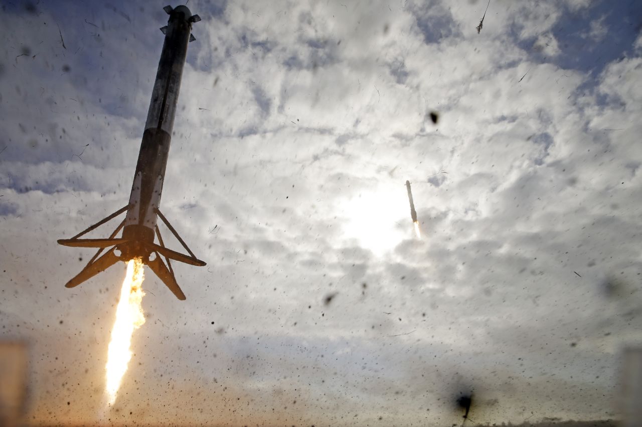 A SpaceX Falcon Heavy rocket's two side boosters return for landing about eight minutes after liftoff in Cape Canaveral, Florida, on Tuesday, November 1. The towering, three-pronged vehicle — which is the most powerful operational rocket in the world — <a href="https://www.cnn.com/2022/11/01/business/spacex-falcon-heavy-launch-ussf-44-scn" target="_blank">returned to the skies</a> for the first time since mid-2019.