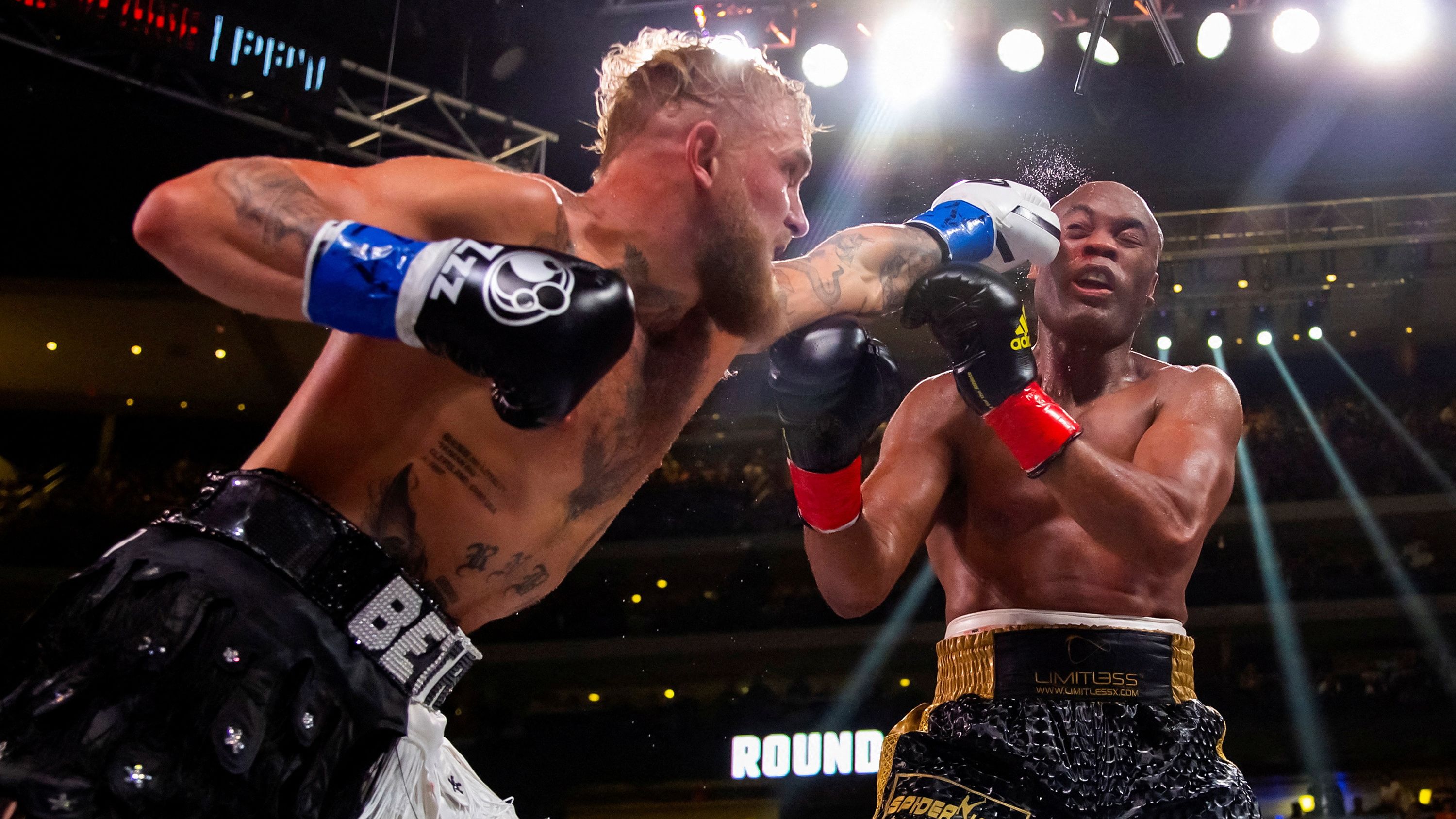 Jake Paul lands a punch on Anderson Silva during a boxing match in Glendale, Arizona, on Saturday, October 29. Paul beat Silva by unanimous decision.