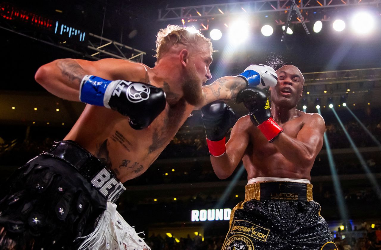 Jake Paul lands a punch on Anderson Silva during a boxing match in Glendale, Arizona, on Saturday, October 29. Paul beat Silva by unanimous decision.