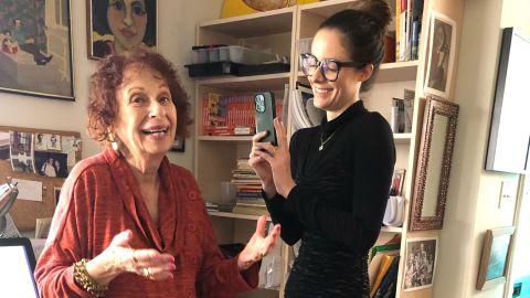 Annie Korzen, 83, and Mackenzie Morrison, 31, record a TikTok at Korzen's Los Angeles home. Both women say the unlikely friendship has changed their lives.