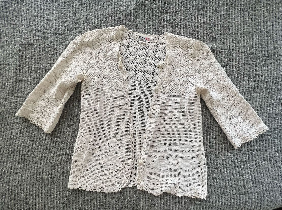 One of Morrison's favorite pieces of clothing is this cardigan Korzen found for her at a thrift store. "I think of her whenever I wear it," Morrison says.
