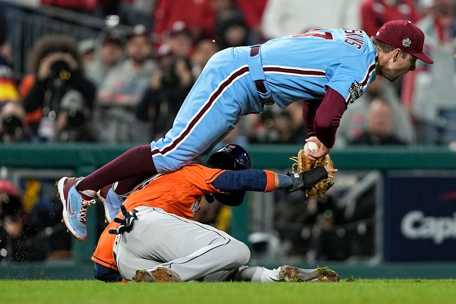 Philadelphia first baseman Rhys Hoskins tags Houston's Yuli Gurriel.