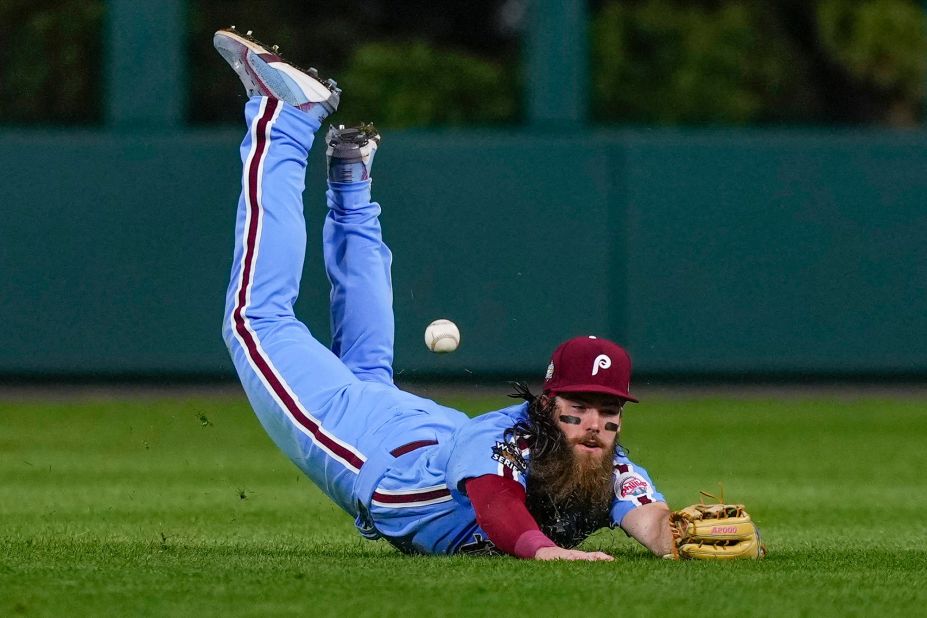 Phillies center fielder Brandon Marsh can't get a glove on a double by Houston's Yuli Gurriel.