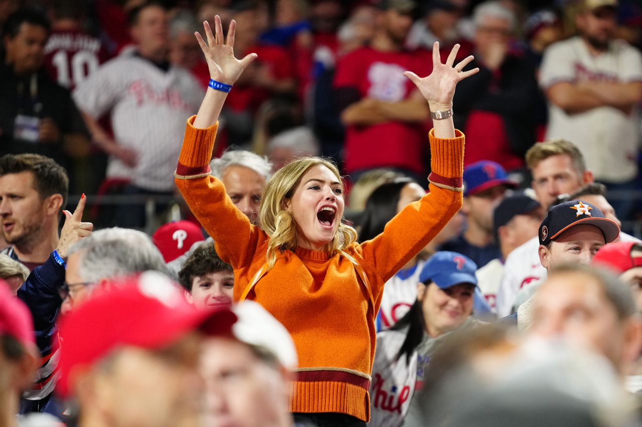 Supermodel Kate Upton, who is married to Astros pitcher Justin Verlander, cheers Thursday night.