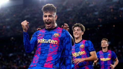 Gerard Pique celebrates after scoring for Barcelona in the Champions League on October 20, 2021.